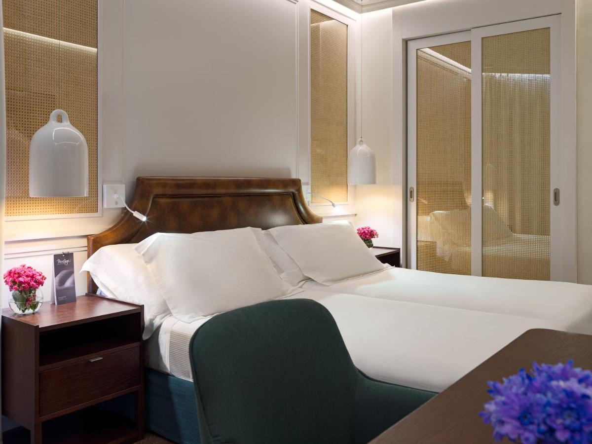 Cama o camas de una habitación en H10 Conquistador