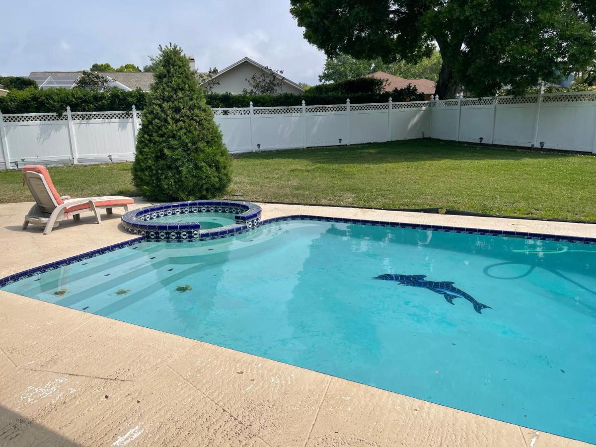 Walk to Indian Rocks Beach Exclusive Use of Hot Tub, Pool, BBQ,with Privacy - Housity