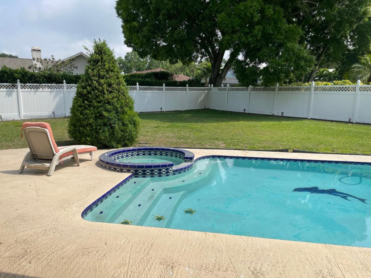 Walk to Indian Rocks Beach Exclusive Use of Hot Tub, Pool, BBQ,with Privacy - Housity