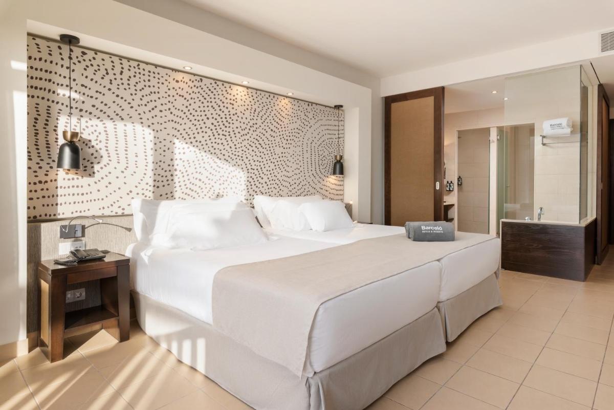 Cama o camas de una habitación en Barceló Tenerife