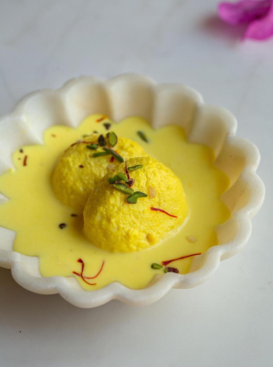 a bowl of food with sauce and green onions on it at Hyatt Regency Jaipur Mansarovar in Jaipur a bowl of food with sauce and green onions on it at Hyatt Regency Jaipur Mansarovar in Jaipur