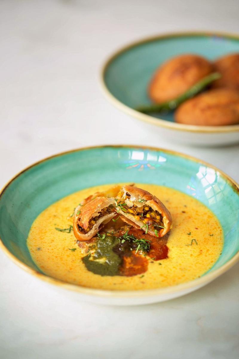 a blue bowl of soup with a mushroom in it at Hyatt Regency Jaipur Mansarovar in Jaipur a blue bowl of soup with a mushroom in it at Hyatt Regency Jaipur Mansarovar in Jaipur