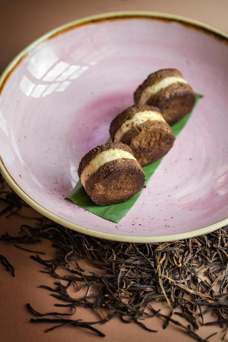 a plate with some food on a pink sauce at Hyatt Regency Jaipur Mansarovar in Jaipur a plate with some food on a pink sauce at Hyatt Regency Jaipur Mansarovar in Jaipur