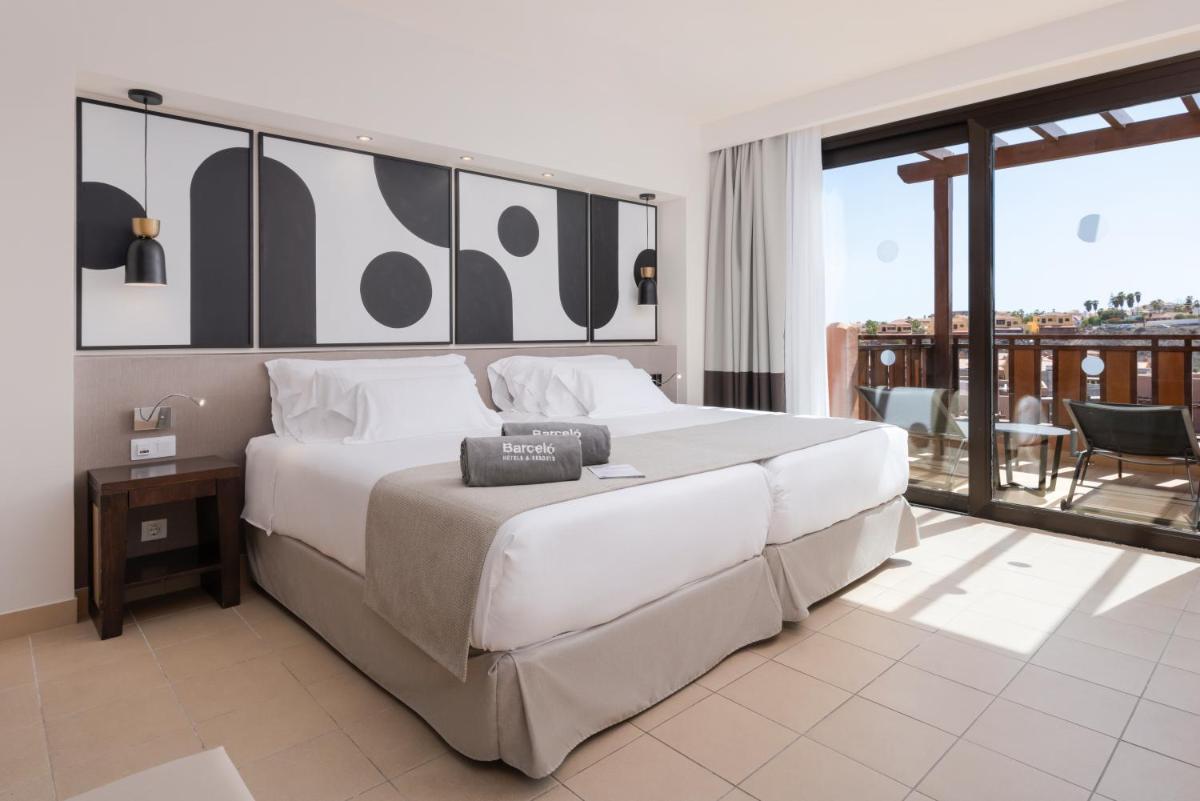 Cama o camas de una habitación en Barceló Tenerife