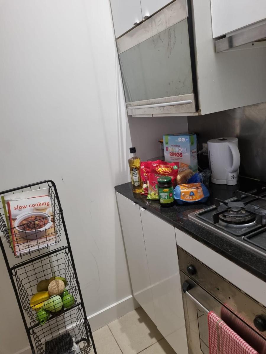 Collins central 2-bd apartment with pre-reserve parking - Hizvo