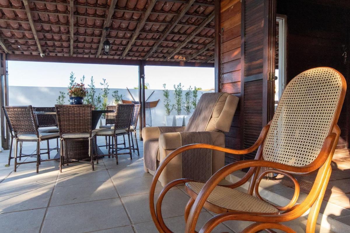Casa pé na areia na melhor localização da Praia de Porto Mirim por Carpediem - Housity