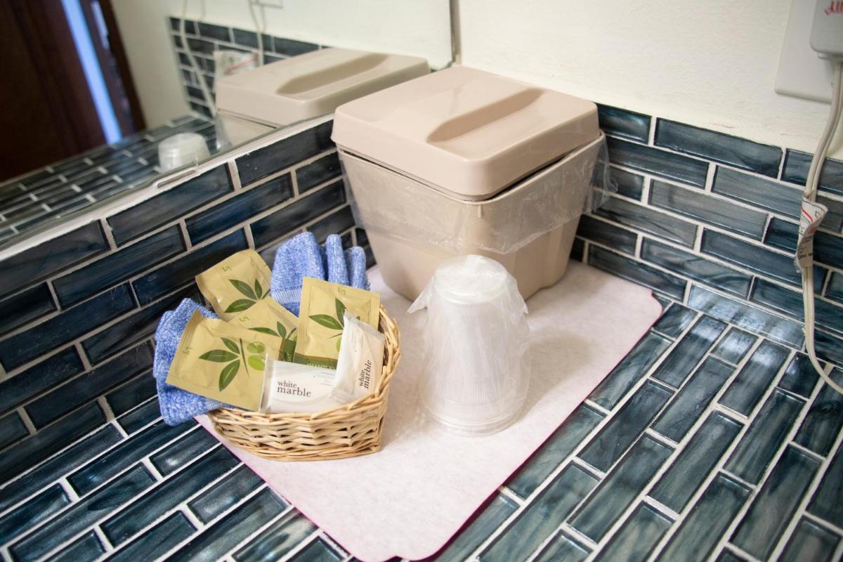 Riverwood Inn Hotel Grand Kitchenette Suite - Housity