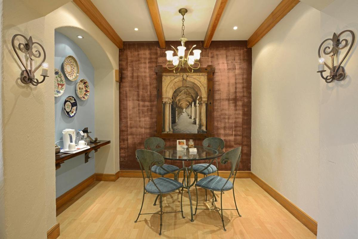 a dining room with a table and chairs at Sun-n-Sand Mumbai Juhu Beach in Mumbai