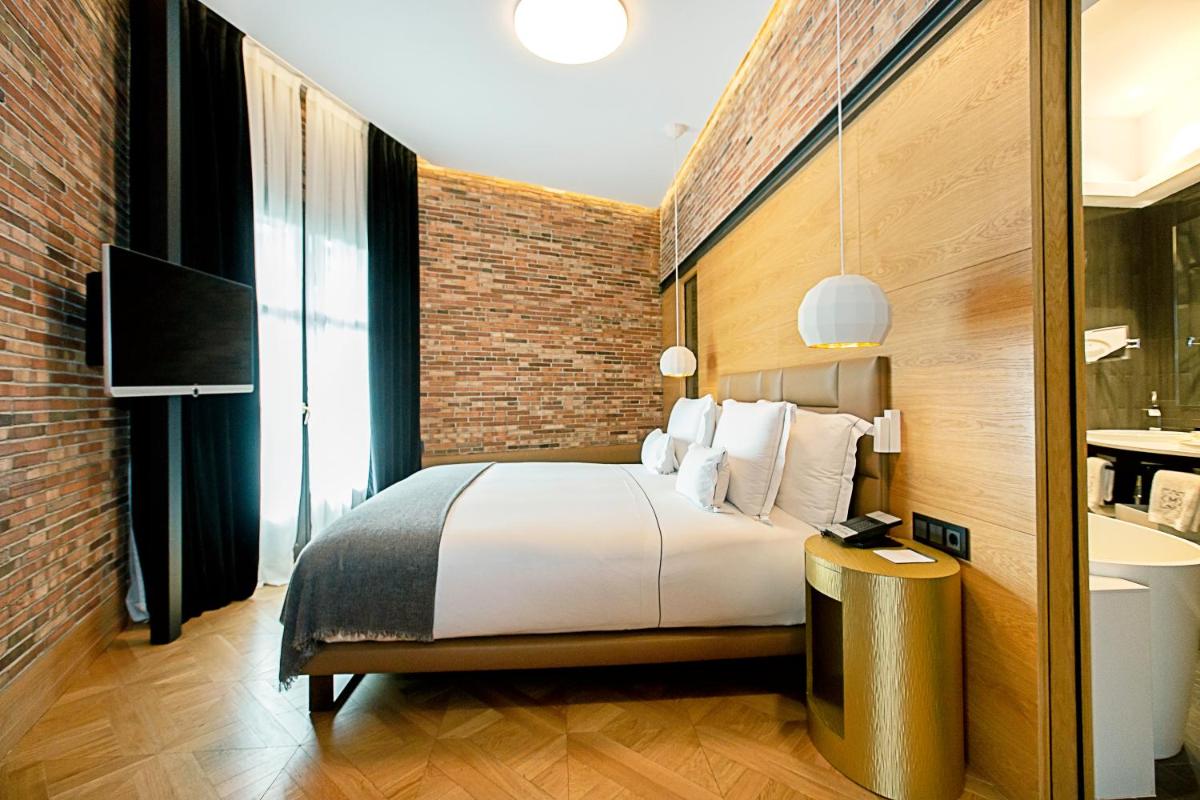 Cama o camas de una habitación en Monument Hotel
