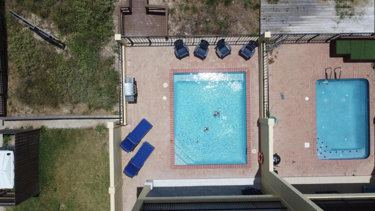Chris Beach Pool Townhome - Housity