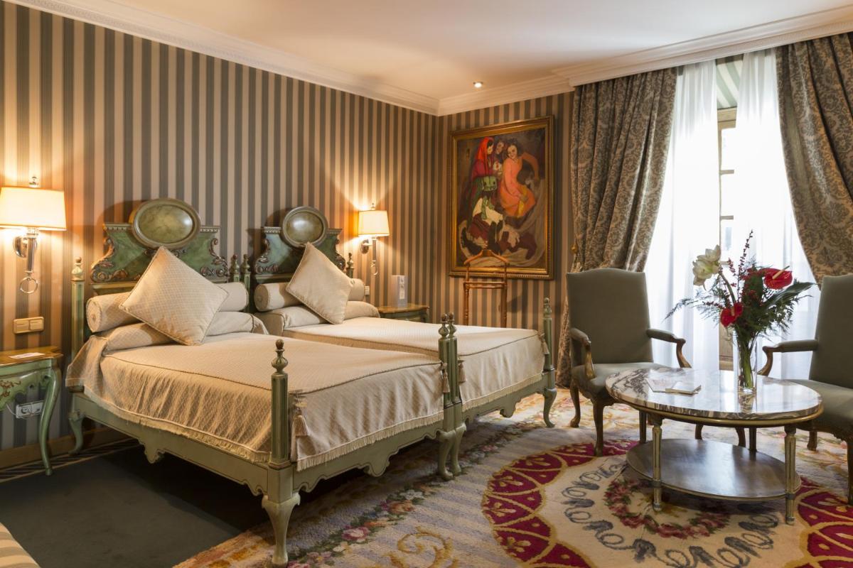 Cama o camas de una habitación en Eurostars Hotel de la Reconquista