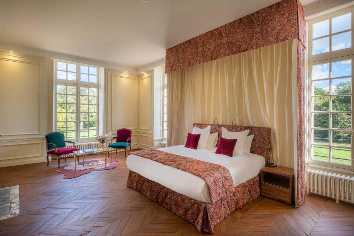 Un ou plusieurs lits dans un hébergement de l'établissement La Borde en Sologne Château & Spa