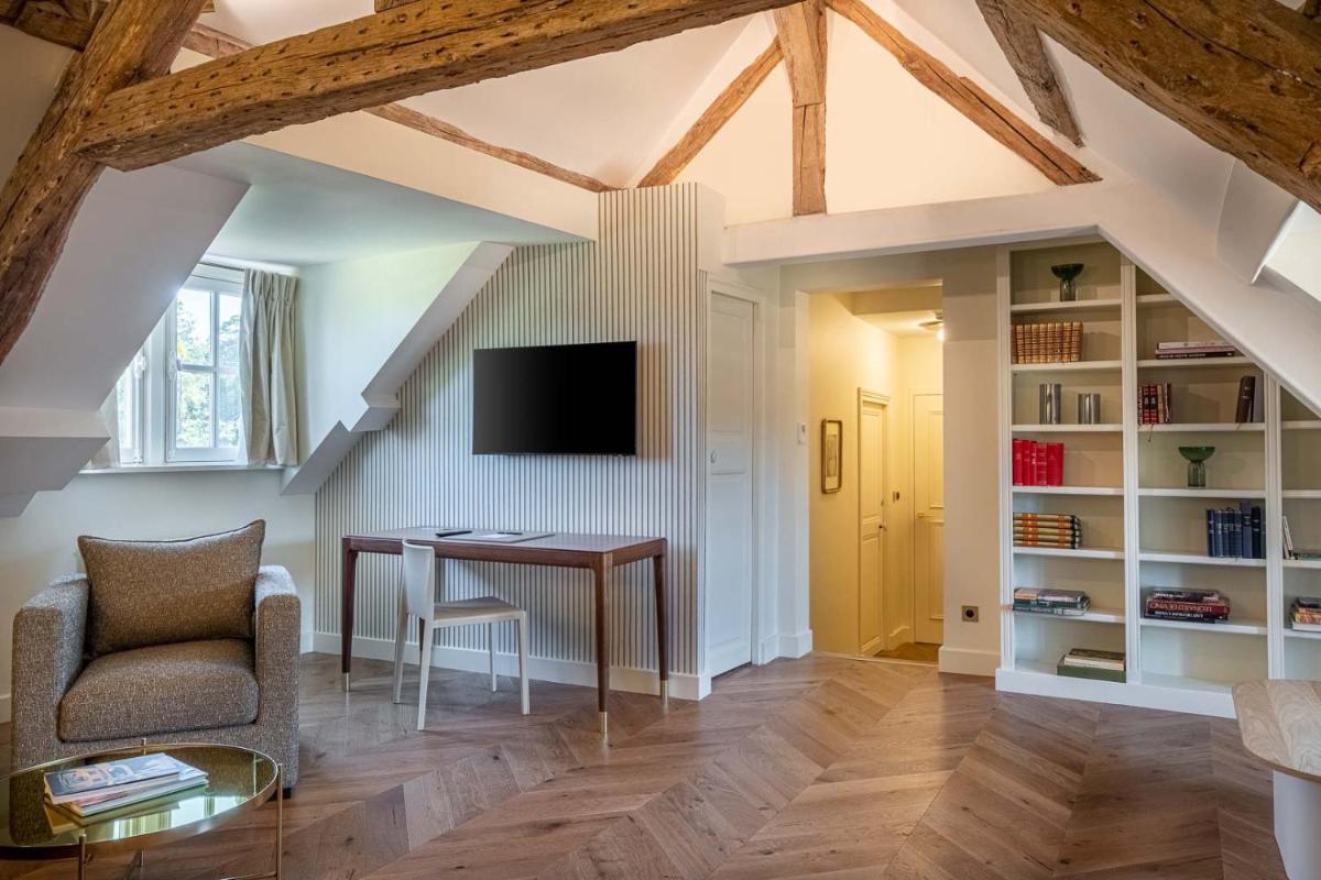 Télévision ou salle de divertissement dans l'établissement La Borde en Sologne Château & Spa