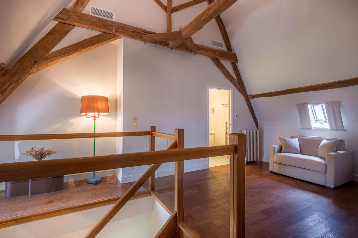 Coin salon dans l'établissement La Borde en Sologne Château & Spa