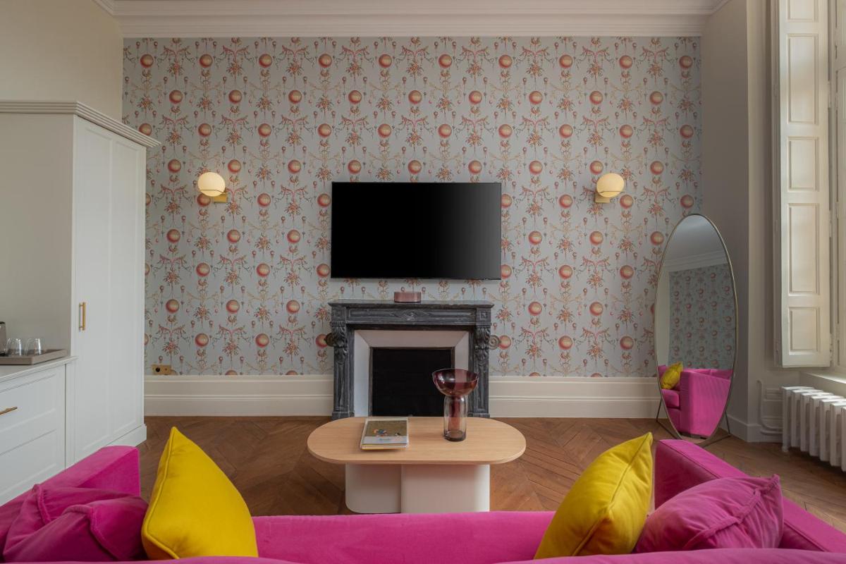 Télévision ou salle de divertissement dans l'établissement La Borde en Sologne Château & Spa