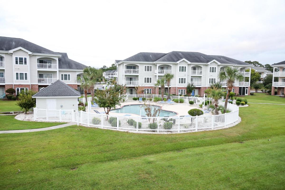 Stunning Condo on Golf Course Near Broadway at the Beach - Housity