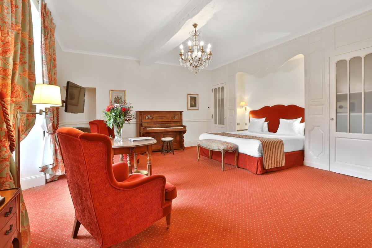 Coin salon dans l'établissement Château des Vigiers