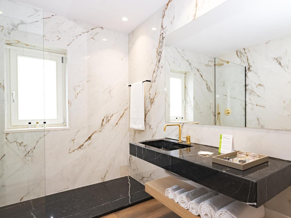 Uma casa de banho em Central Monchique Hotel - Villa Termal Spa Resort - by Unlock Hotels
