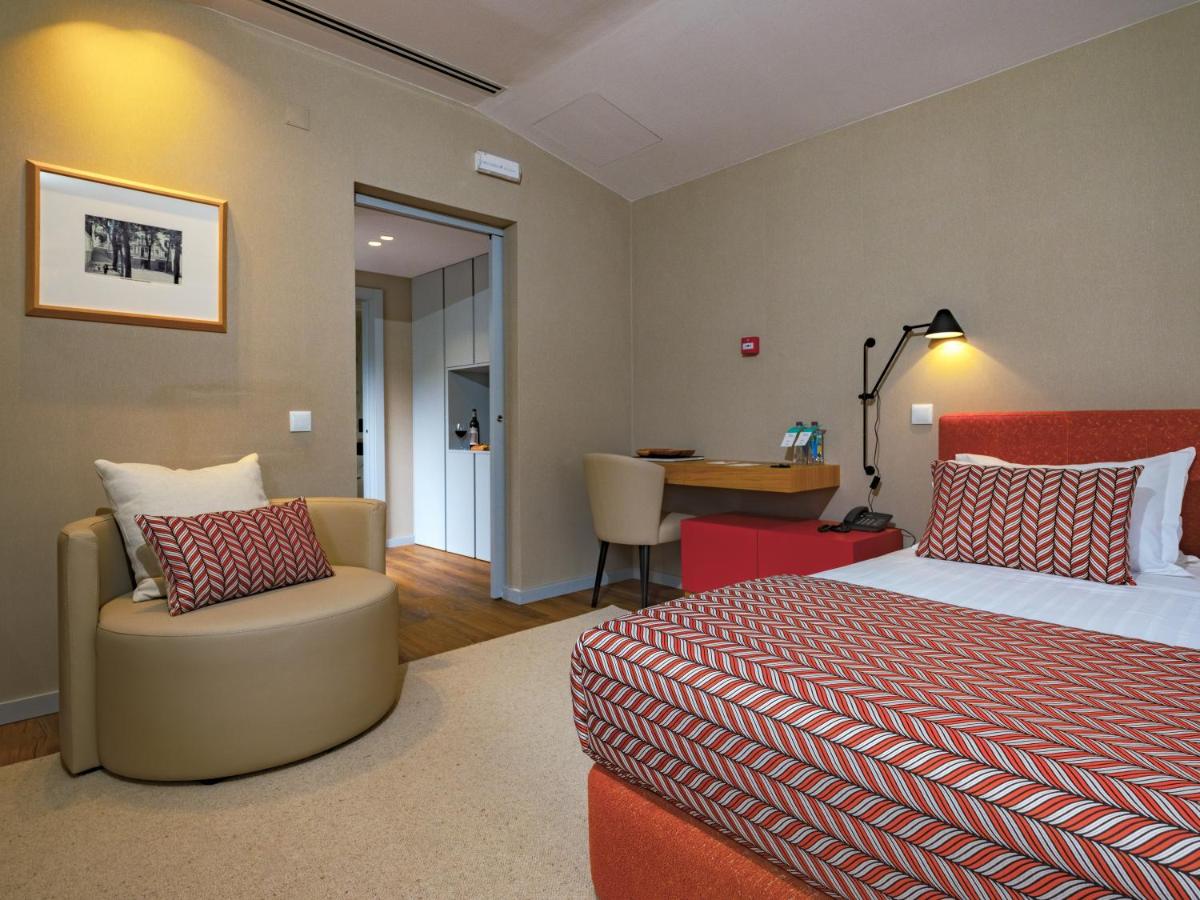 Uma cama ou camas num quarto em Central Monchique Hotel - Villa Termal Spa Resort - by Unlock Hotels