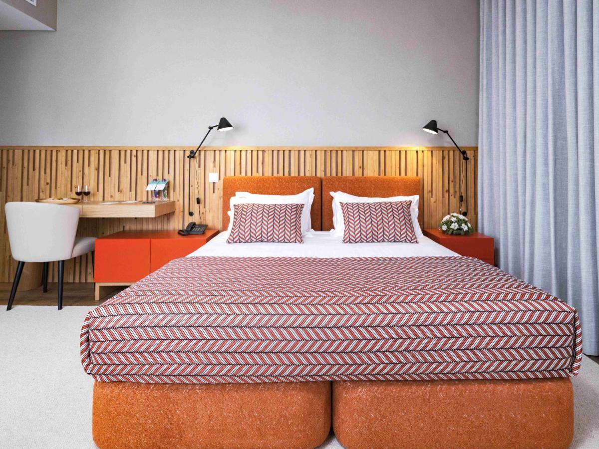 Uma cama ou camas num quarto em Central Monchique Hotel - Villa Termal Spa Resort - by Unlock Hotels