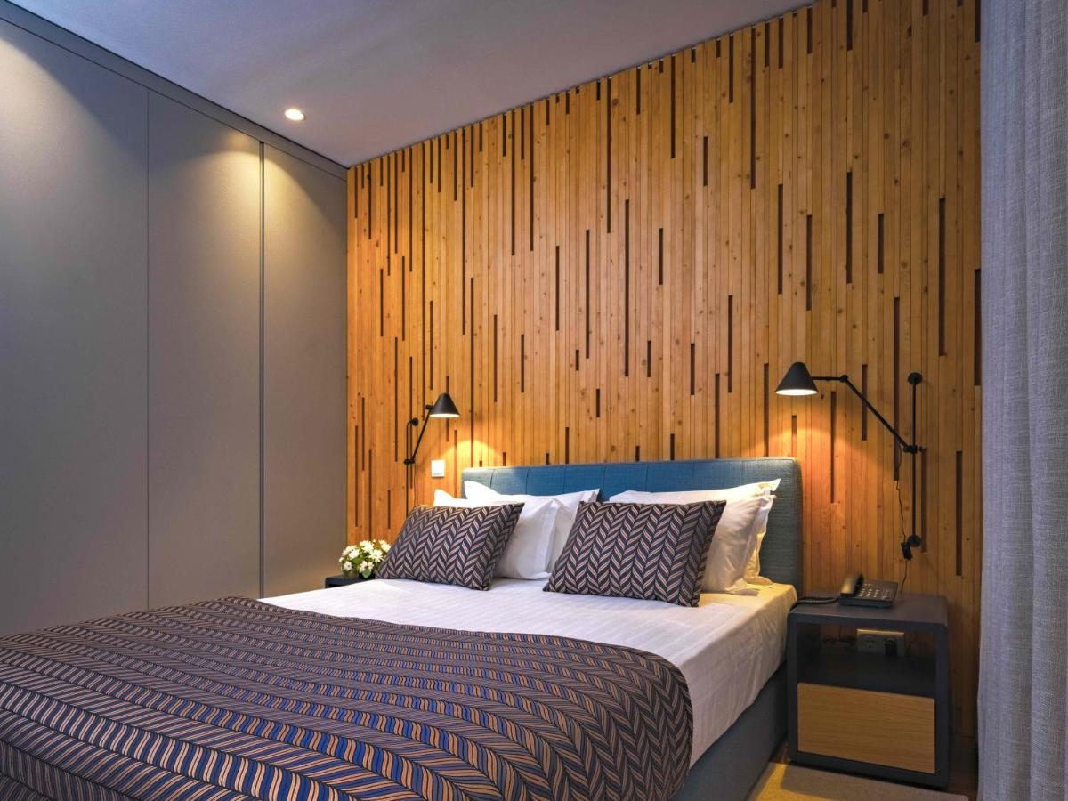 Uma cama ou camas num quarto em Central Monchique Hotel - Villa Termal Spa Resort - by Unlock Hotels