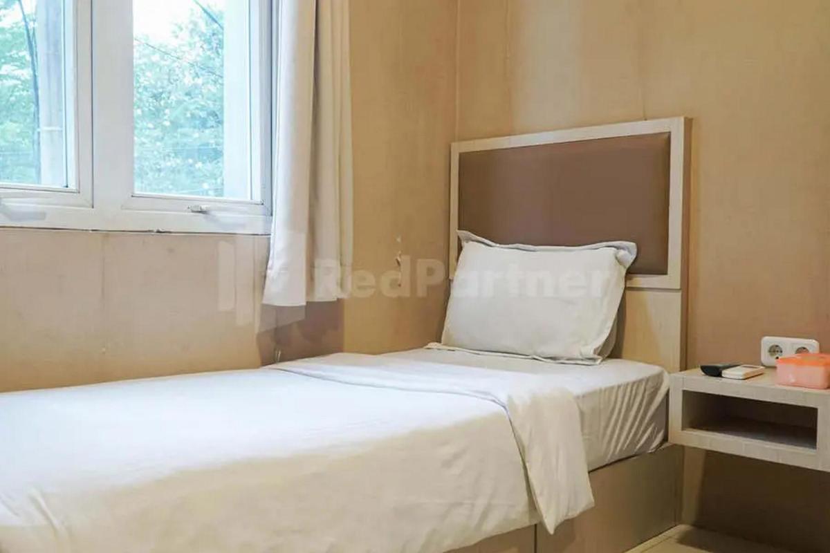 Deli Homestay near DeliPark Mall Medan RedPartner - Housity