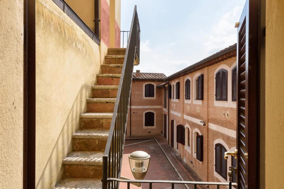 Bea Boutique House a few steps from Piazza del Campo - Housity