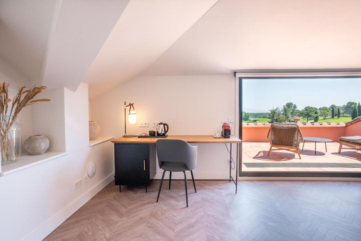 Zona de estar de Hotel TorreMirona Golf & Spa