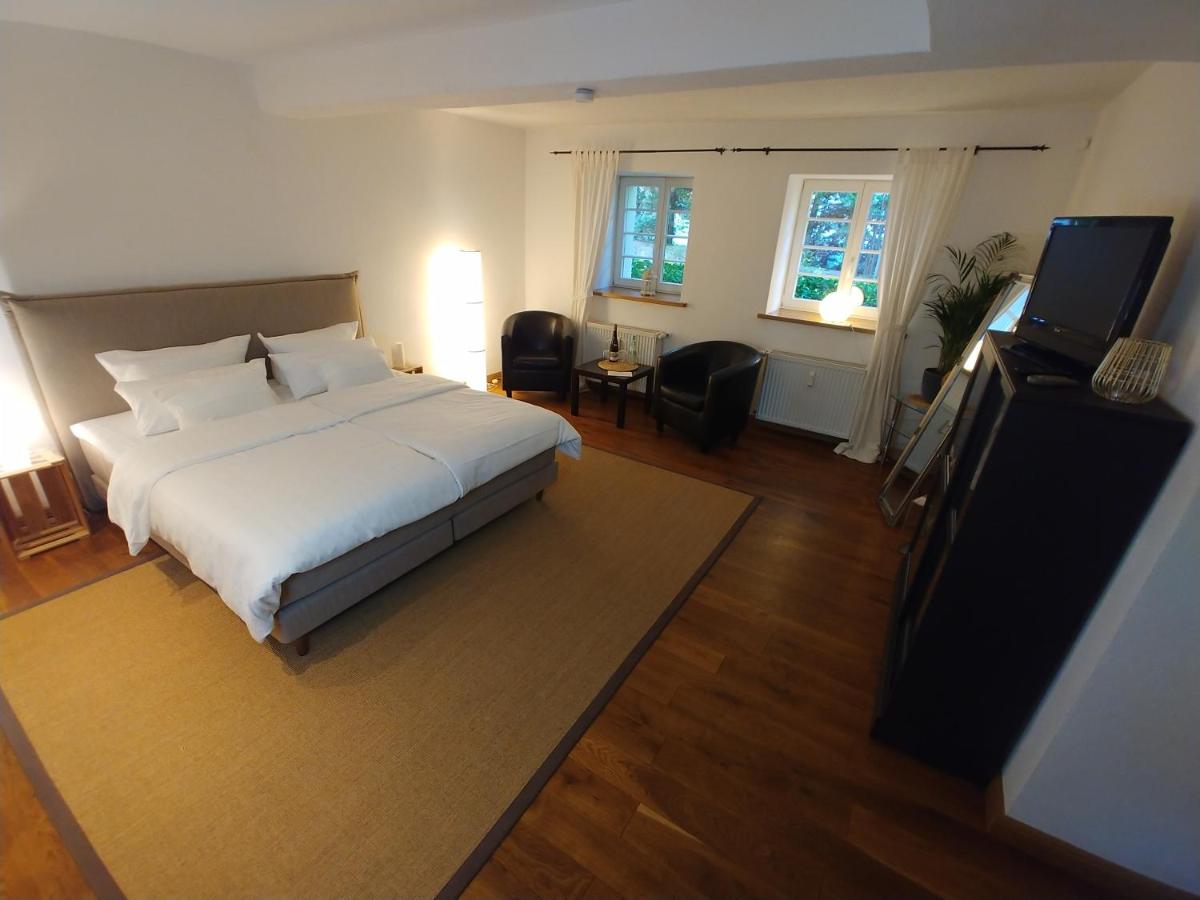 Ein Bett oder Betten in einem Zimmer der Unterkunft Wein- und Landhaus S A Prüm