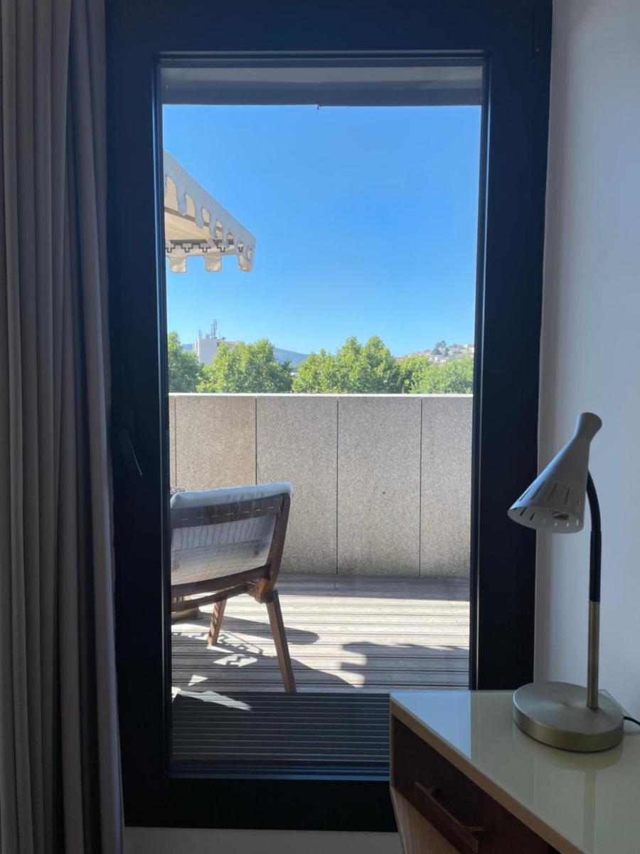 Uma varanda ou terraço em Castelo Hotel