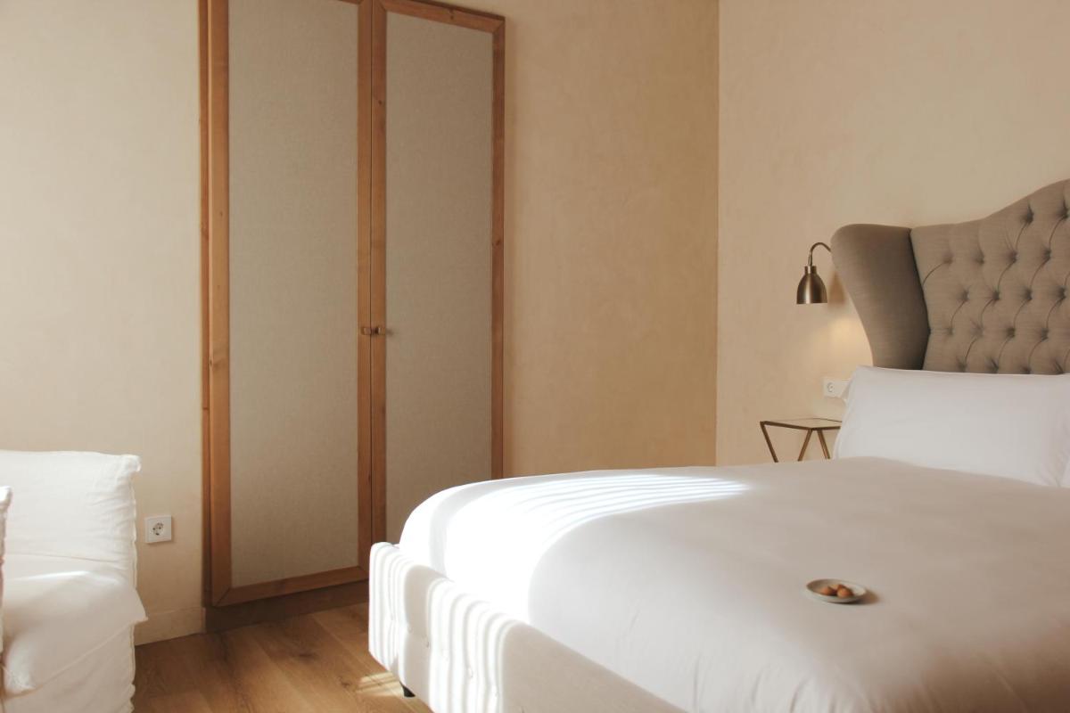 Cama o camas de una habitación en Hotel Palau Macelli & Spa