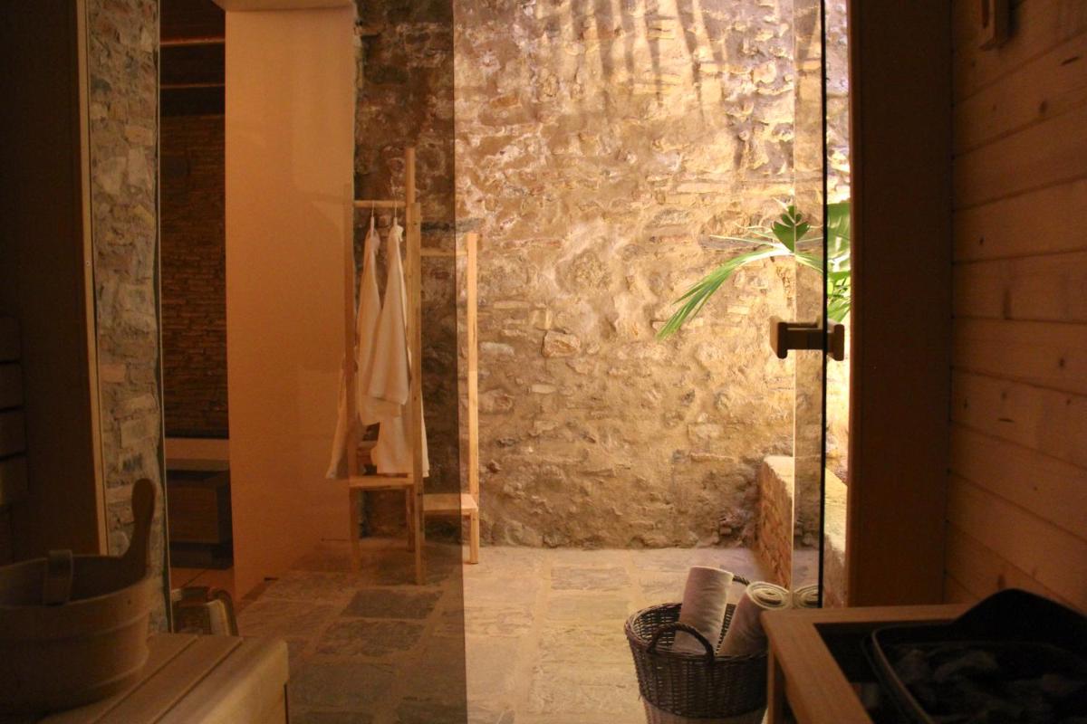 Un baño de Hotel Palau Macelli & Spa