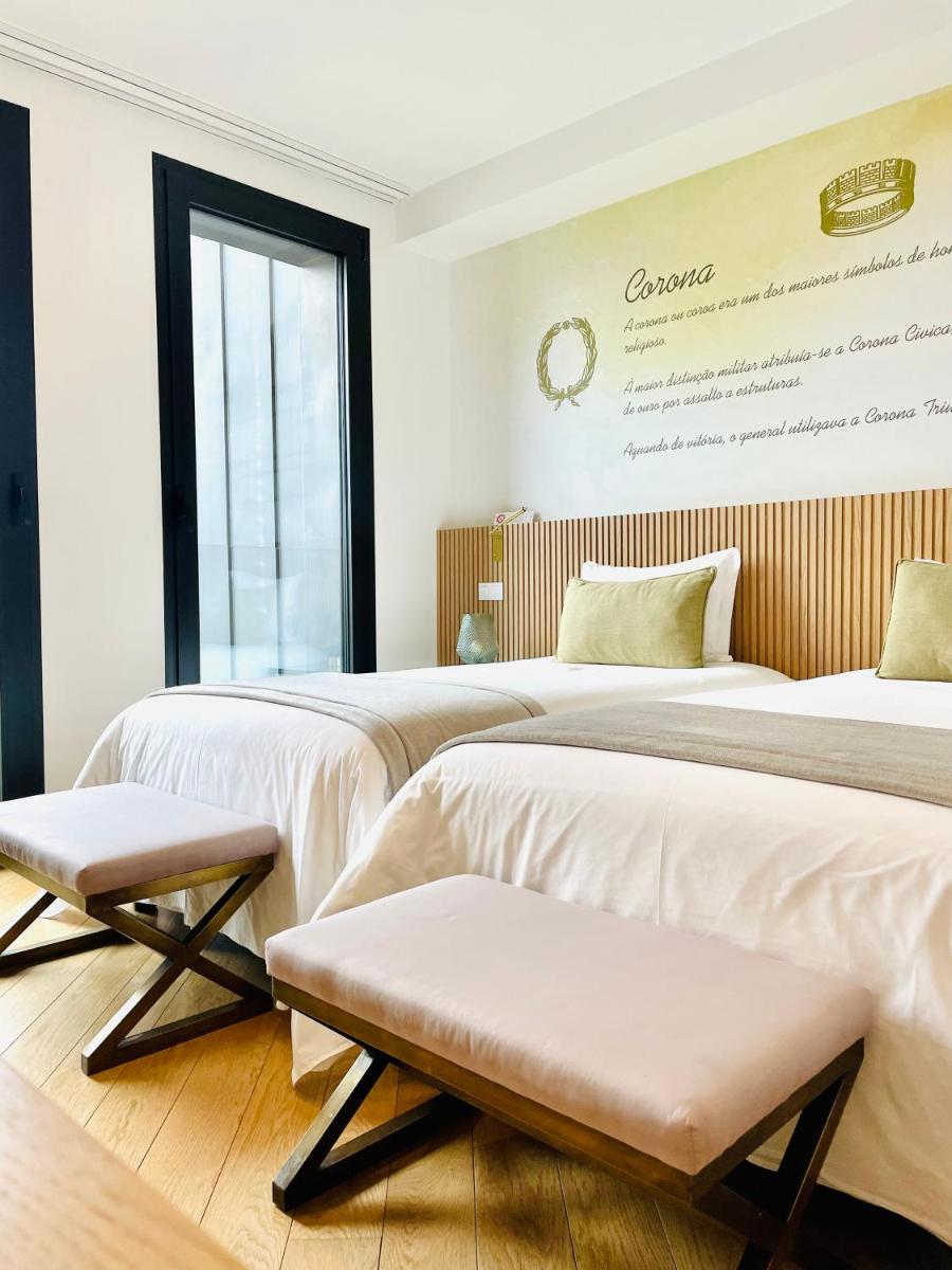 Uma cama ou camas num quarto em Castelo Hotel