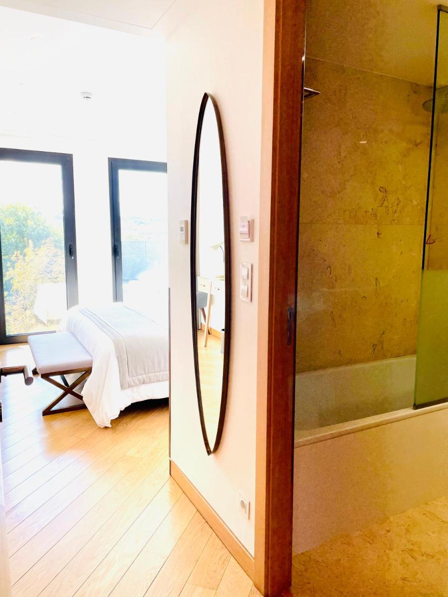 Uma cama ou camas num quarto em Castelo Hotel