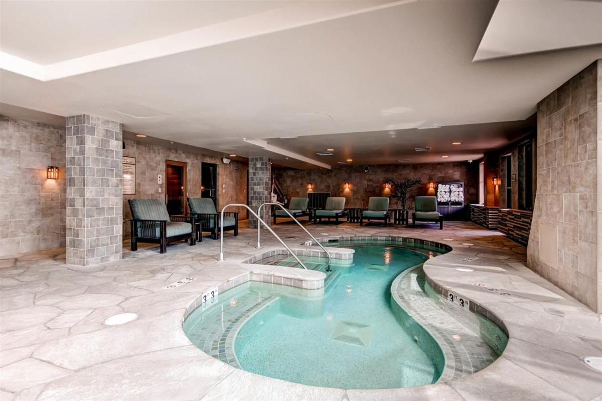 Luxury 3 Bedroom Ski In, Ski Out One Ski Hill Residence Located At The Base Of Peak 8 With Hot Tub Access - Housity