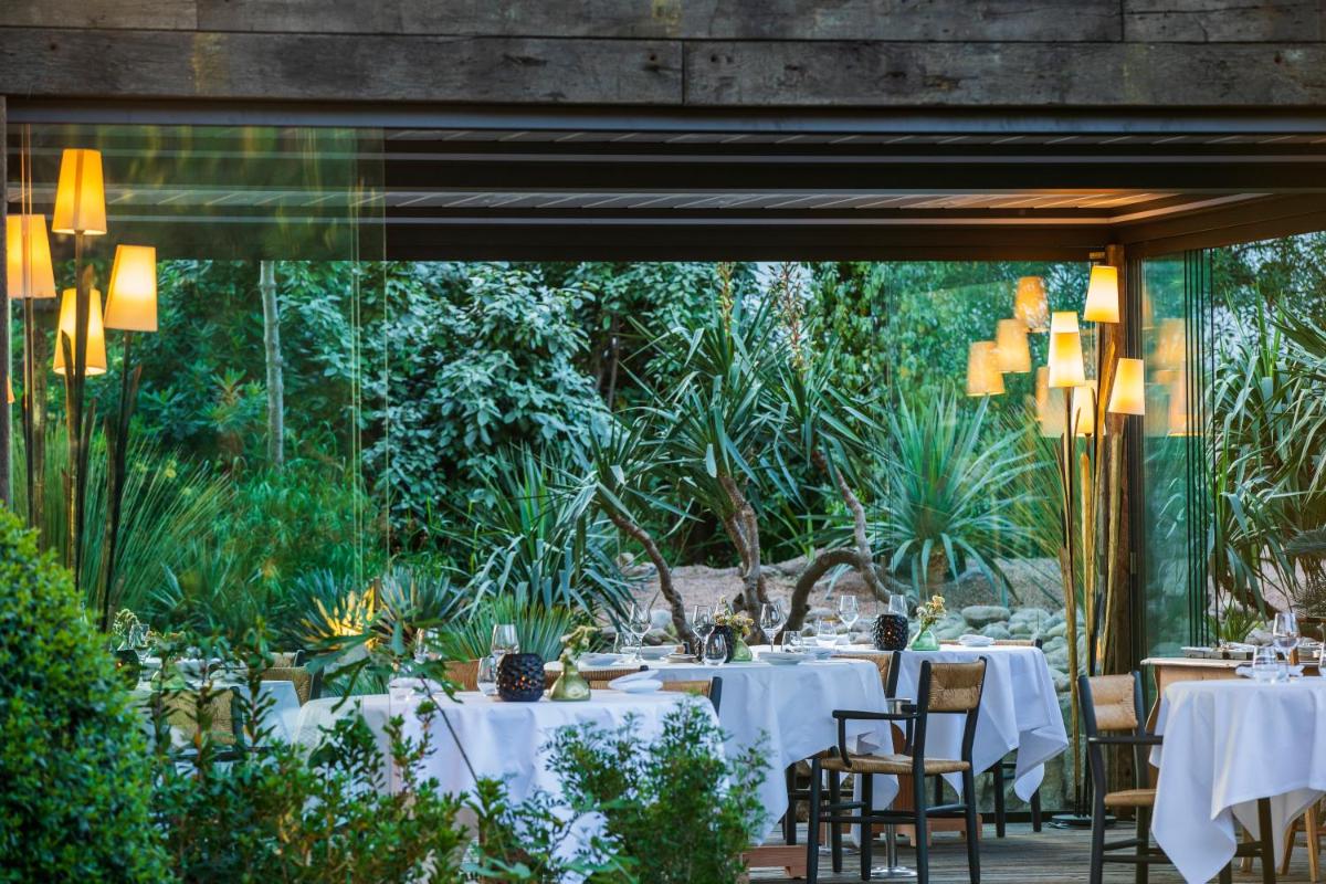 Jardin de l'établissement Grand Hôtel De Cala Rossa & Spa Nucca