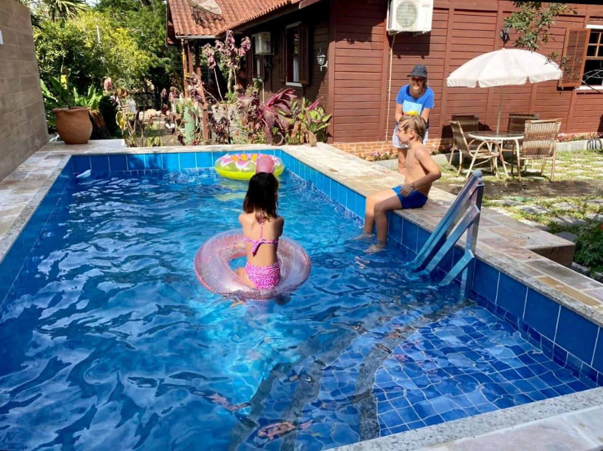 Casa Recanto da Coruja na Serra - Charme e Conforto com Piscina, Sauna e Cachoeira - Housity