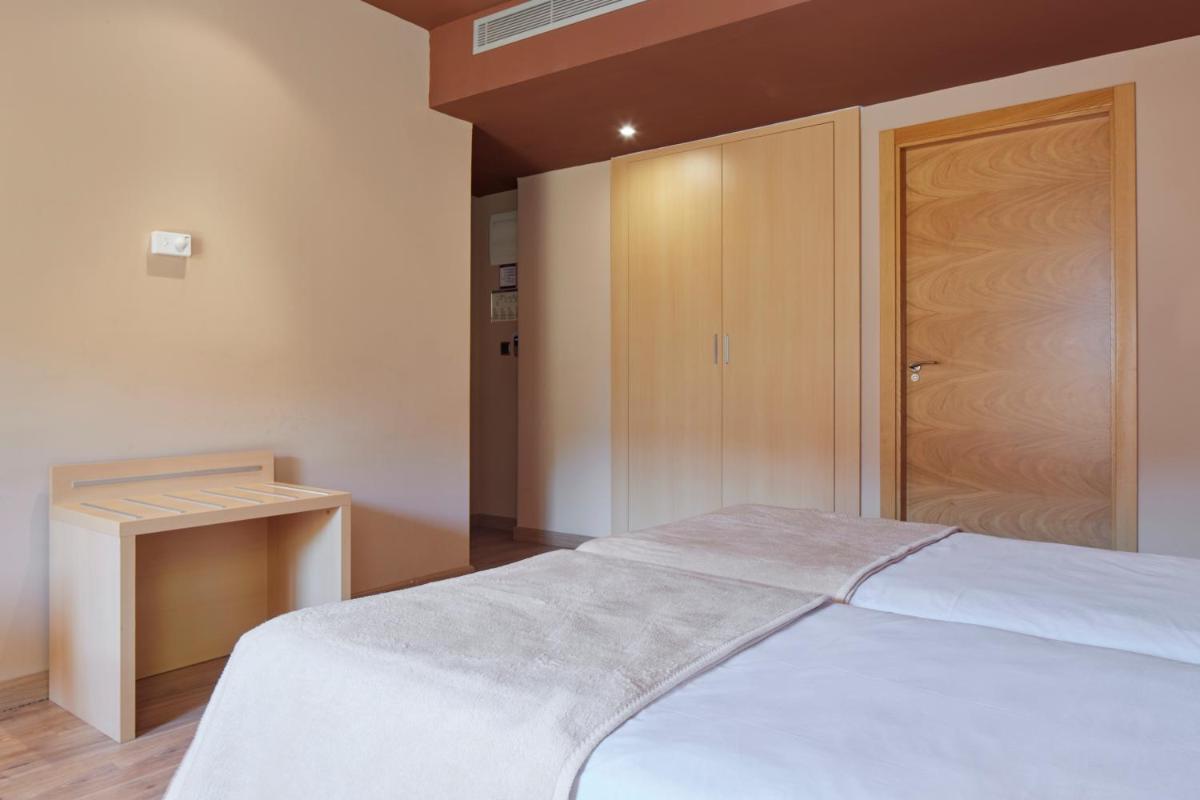 Cama o camas de una habitación en Iraipe Santuario de Arantzazu Hotel