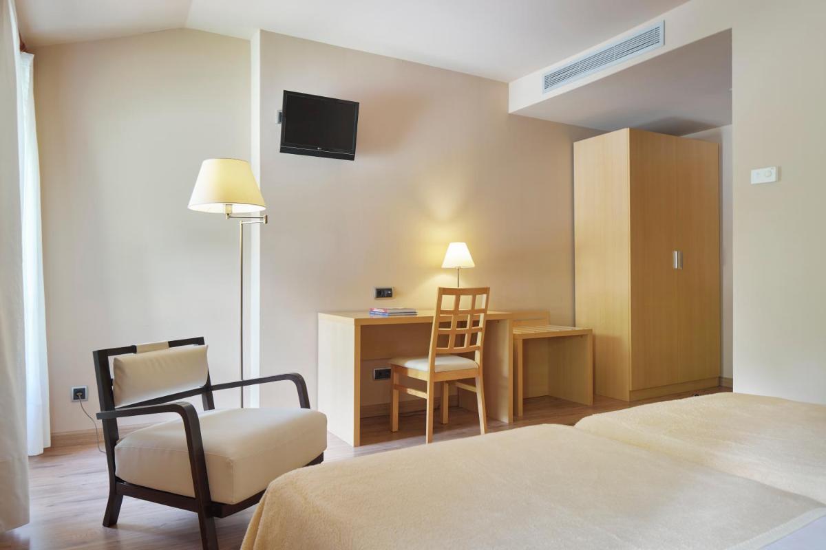 Cama o camas de una habitación en Iraipe Santuario de Arantzazu Hotel