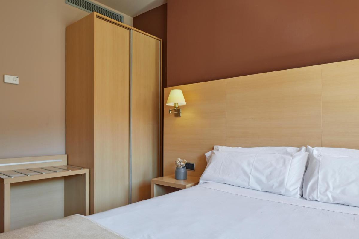 Cama o camas de una habitación en Iraipe Santuario de Arantzazu Hotel