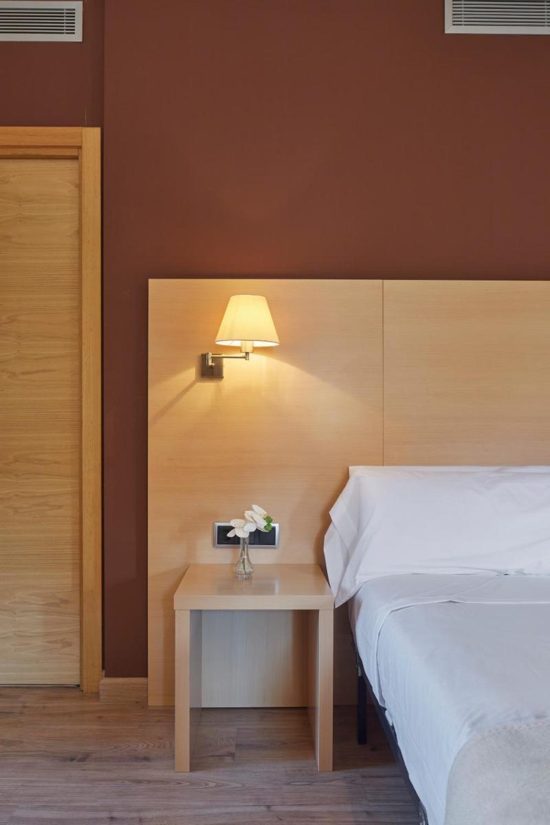 Cama o camas de una habitación en Iraipe Santuario de Arantzazu Hotel