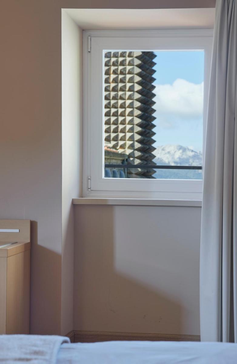Cama o camas de una habitación en Iraipe Santuario de Arantzazu Hotel