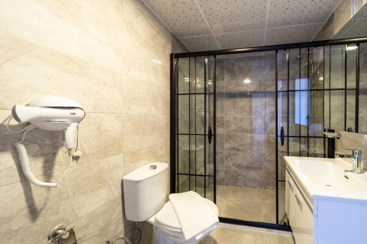 Sea View Flat With Balcony Near Beach in Aksu - Housity