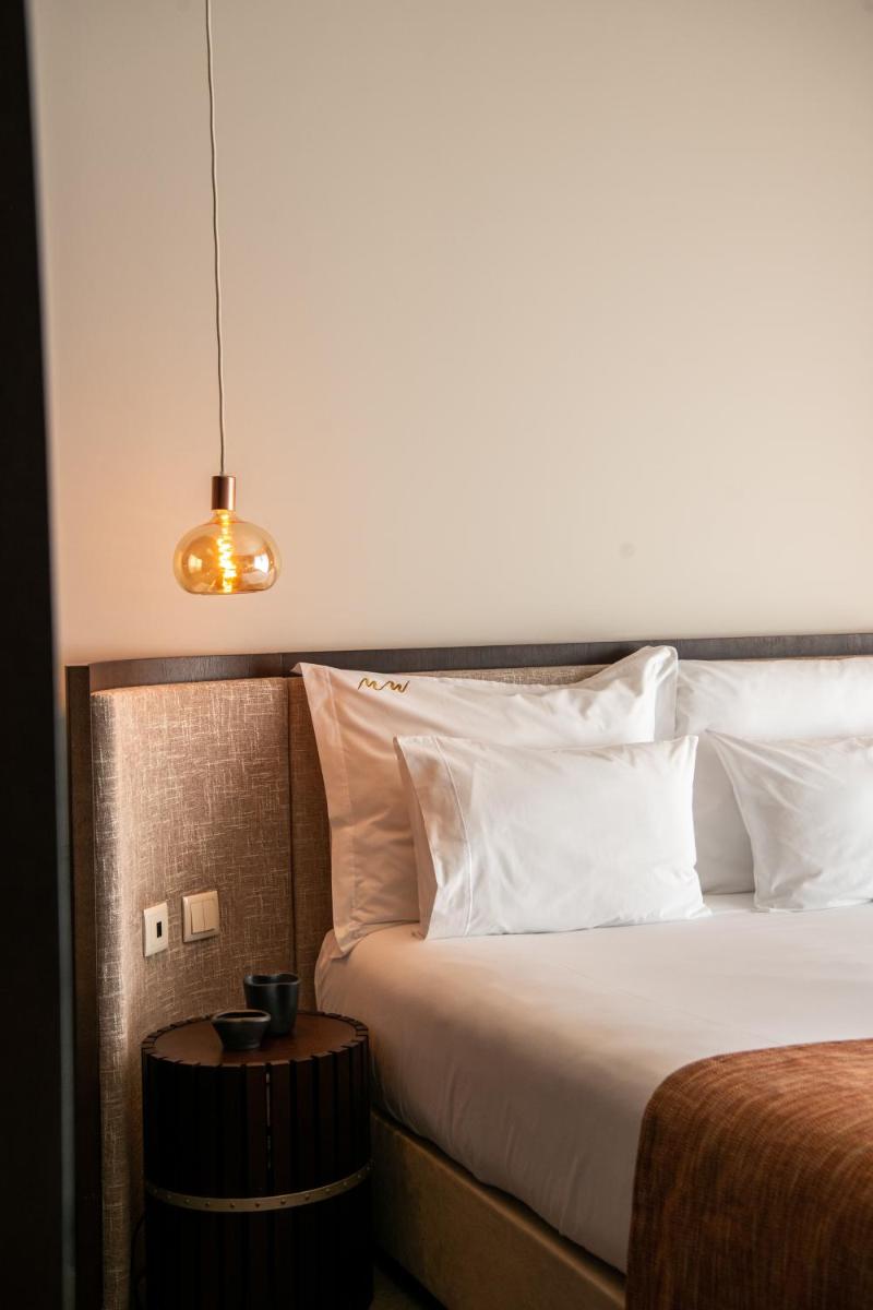Uma cama ou camas num quarto em MW Douro Wine & Spa