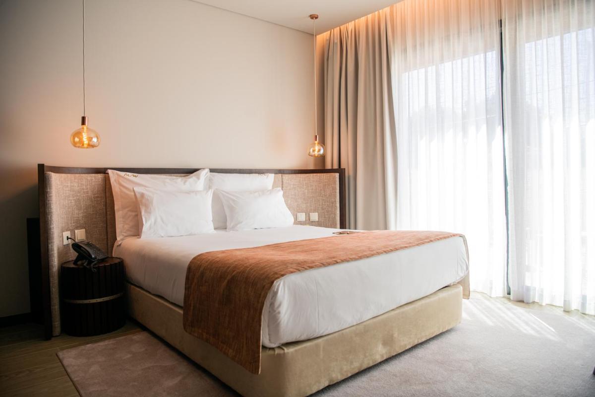 Uma cama ou camas num quarto em MW Douro Wine & Spa