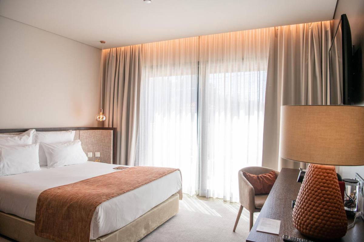 Uma cama ou camas num quarto em MW Douro Wine & Spa