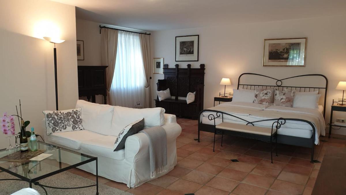 Ein Bett oder Betten in einem Zimmer der Unterkunft Wein- und Landhaus S A Prüm