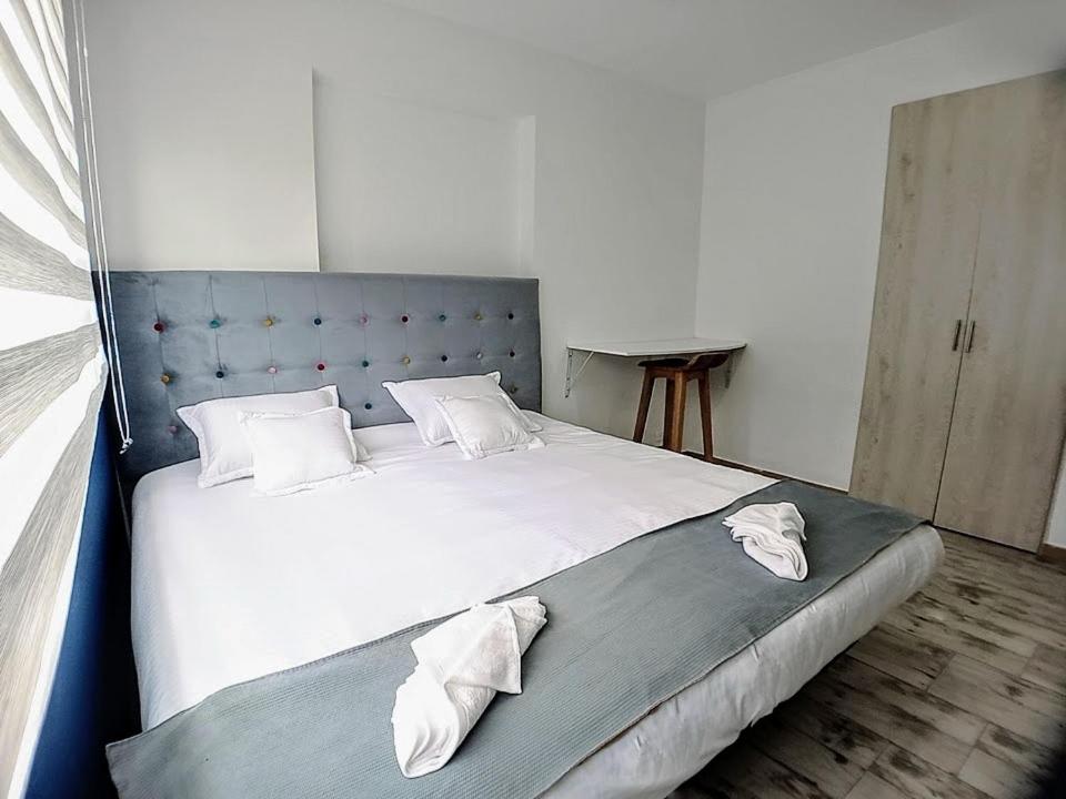 Suitetrails - ApartaSuites Bogota ROMANNOTI