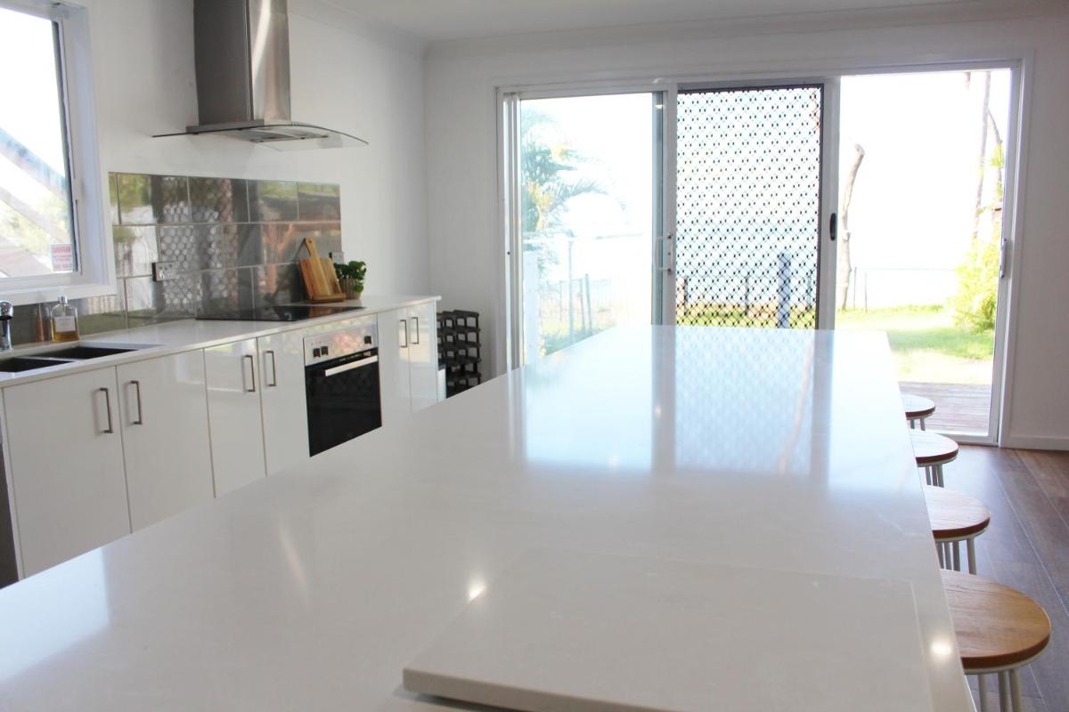 Tuggerah lakefront 4 bed 2 bath home with stunning views - Housity