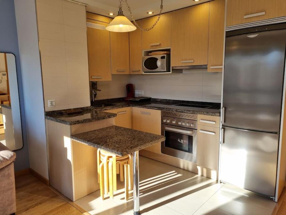 20A01 - Precioso apartamento con piscina y garaje - Housity